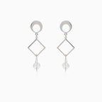 Unconventional silver earrings with pearl