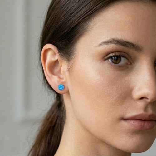 Flat blue opal studs