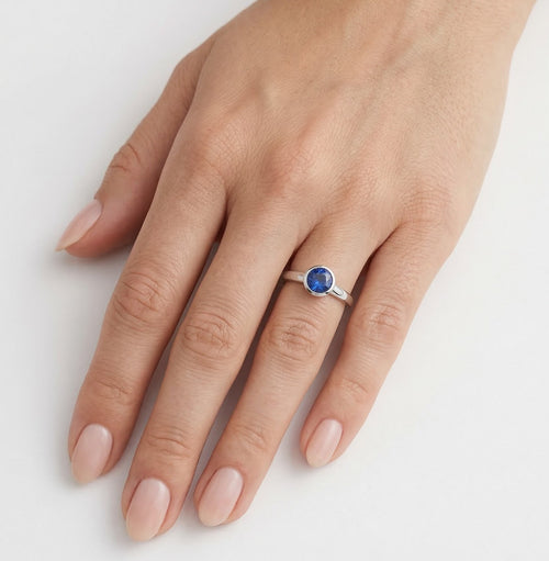 Classic white gold ring with sapphire