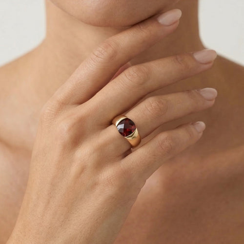 Sophisticated garnet gold gentlemen ring