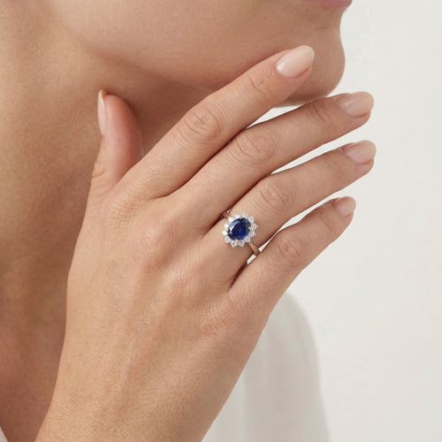 Ring with Oval Shape Sapphire and Diamonds