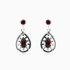 Boucles d’oreilles pendantes en grenat taille poire