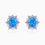 Sternförmige Ohrringe mit blauem Opal