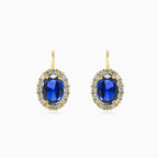 Oval blue quartz in gold earrings