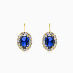 Oval blue quartz in gold earrings