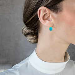Boucles d'oreilles halo en turquoise.