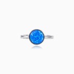 Ring mit rundem blauem Opal