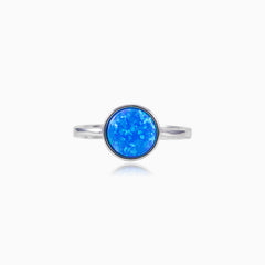 Ring mit rundem blauem Opal