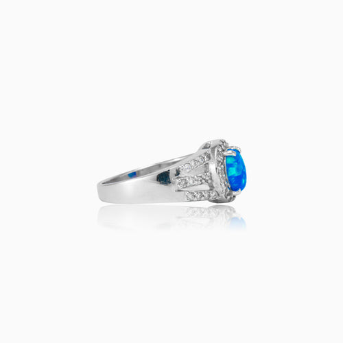 Bague royale sécurisée en opale bleue ronde