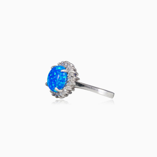 Halo-runder-blauer-Opal-Ring