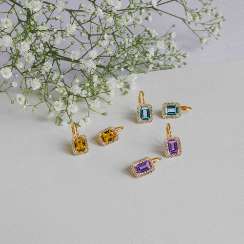 Zlaté náušnice s modrým topazem