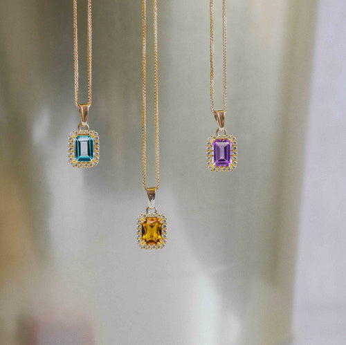 Colgante con halo de esmeralda y amatista