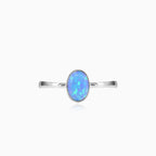 Bague solitaire simple en opale bleue