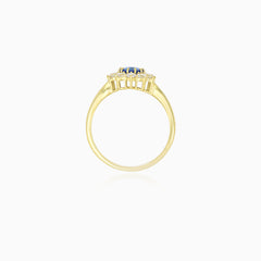 Bague en or jaune avec zircone cubique et saphir