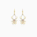 Boucles d’oreilles pendantes en forme de toile d’araignée