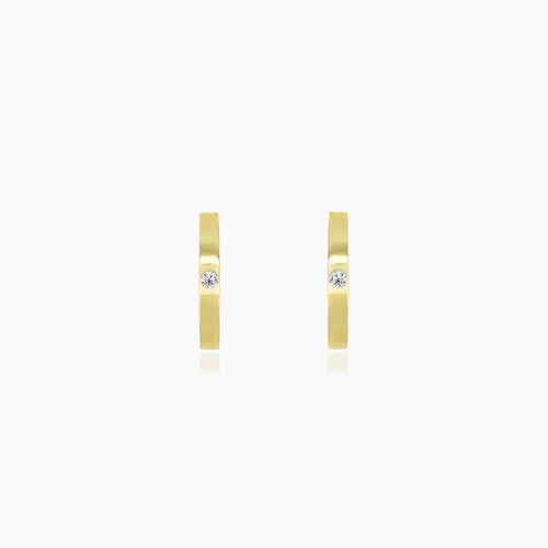 Boucles d’oreilles créoles en or jaune avec zirconium