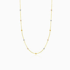 Golden necklace with ten golden marbles