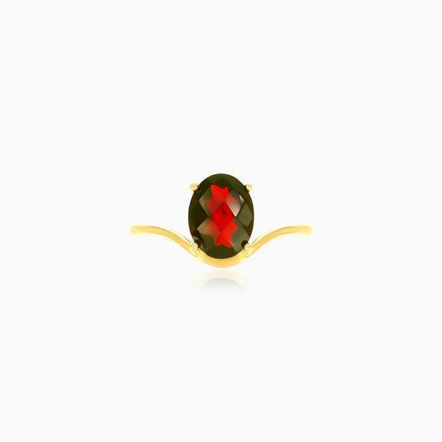 Anillo de oro amarillo con granate talla ovalada