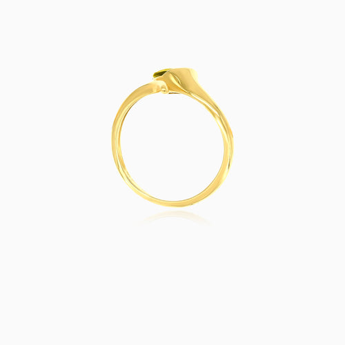 Gold ring with pear cut moldavite