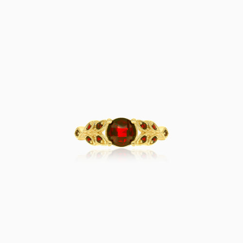 Elegant yellow gold ring with round garnet