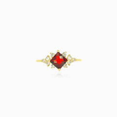 Anillo de oro elegante con granate y circonia cúbica