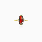Garnet oval cut gold ring on bar set