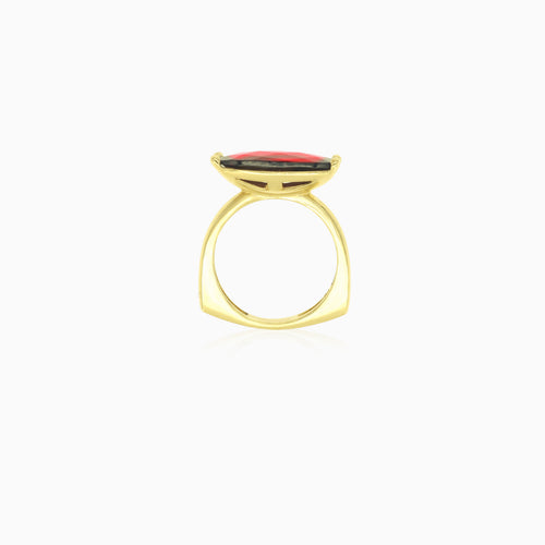Solitaire garnet stone ring in yellow gold