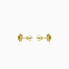 Eternal Radiance stud earrings in gold with  moldavite and garnet
