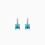 Sterling silver drop earrings with blue topaz