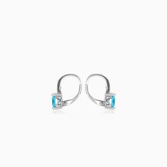 Sterling silver drop earrings with blue topaz