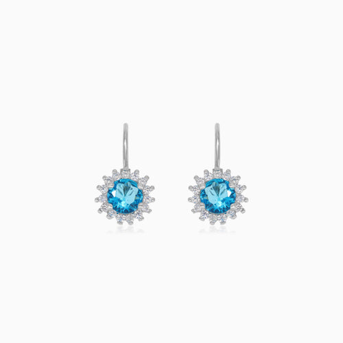 Halo sterling silver drop earrings with blue topaz