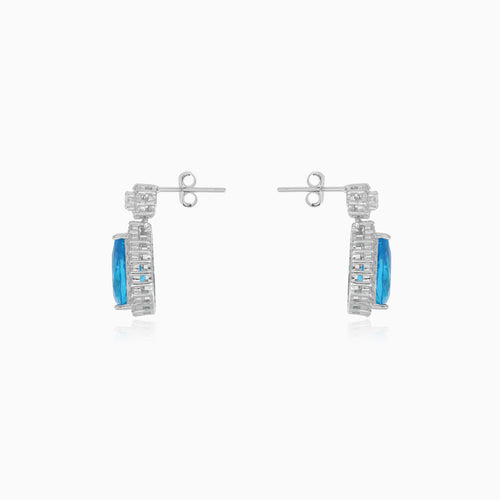Halo sterling silver drop earrings with blue topaz