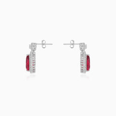 Boucles d'oreilles pendantes halo en argent sterling avec rubis