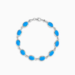 Sterling silver bracelet with blue opal accents