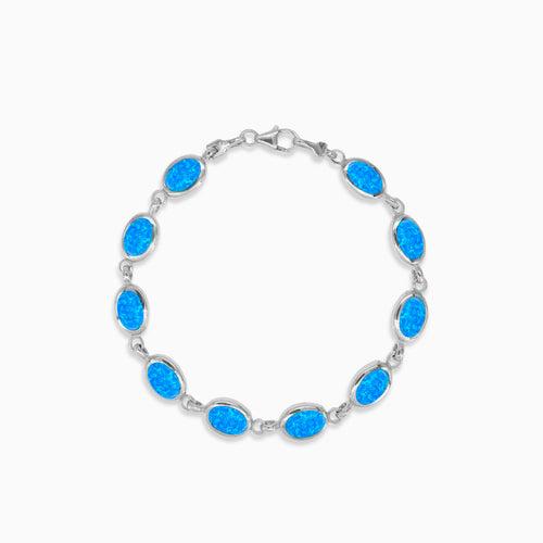 Sterling silver bracelet with blue opal accents