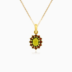 Royal Radiance en or jaune avec moldavite taille ovale et grenat taille ronde