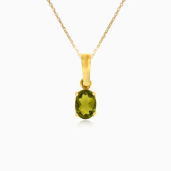Přívěsek ze žlutého zlata s oválným vltavínem