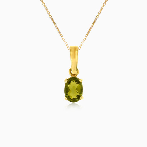 Přívěsek ze žlutého zlata s oválným vltavínem