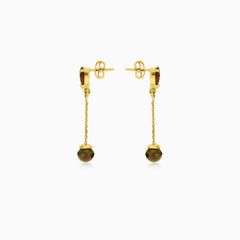 Zlaté visací náušnice s kapkou granátu