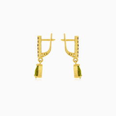 Strahlende Moldavit- und Granat-Tropfen