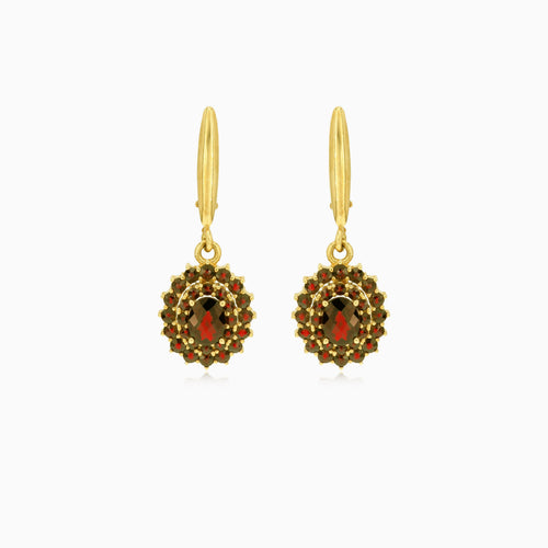 Regal 14kt gold garnet dangling earrings