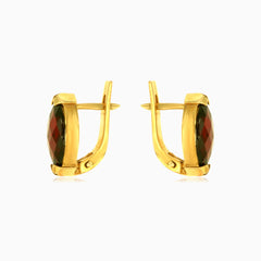 Elegancia dorada con granate marquesa