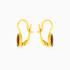 Klasické zlaté náušnice s oválným granátem