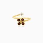 Zlatý nedokončený prsten s květinovým vzorem z granátů