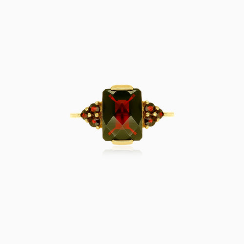 Elegant garnet ring duo in yellow gold