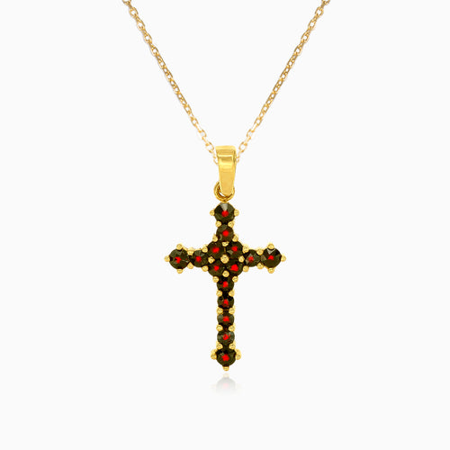 Přívěsek v podobě stylového kříže s kulatým granátem