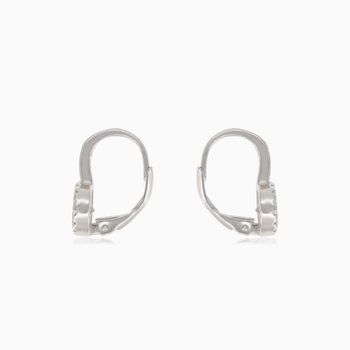 Boucles d’oreilles pendantes en argent avec zirconia cubique principal et accent en zirconia cubique sur le dessus.