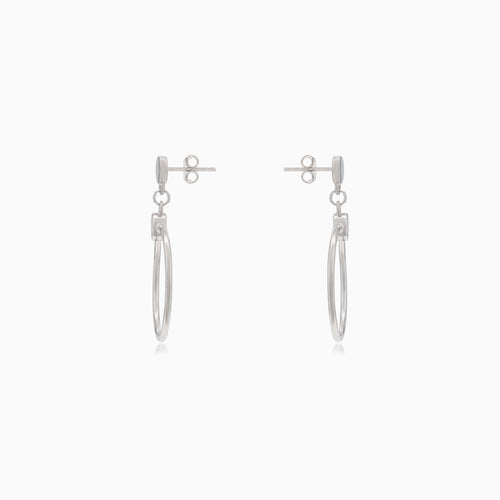 Silver stud earrings dangling circles