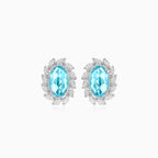Silver topaz earrings with cubic zirconia around