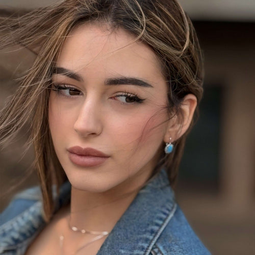 Stříbrné náušnice s modrým oválným opálem